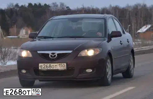 Фото автомобиля MAZDA 3, 2007 — госномер Е268ОТ150. Цвет: ВИШНЕВЫЙ ТЕМНЫЙ