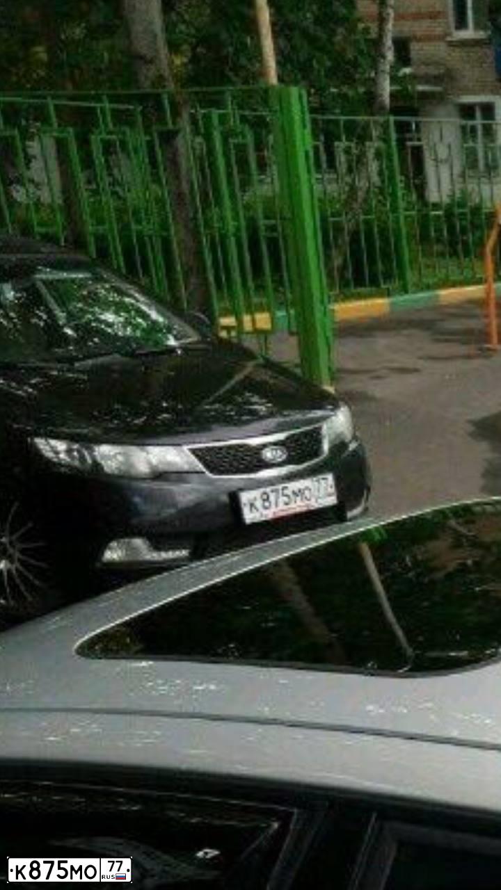 Фото автомобиля KIA CERATO, 2012 — госномер М128ТЕ69. Цвет: ЧЕРНЫЙ