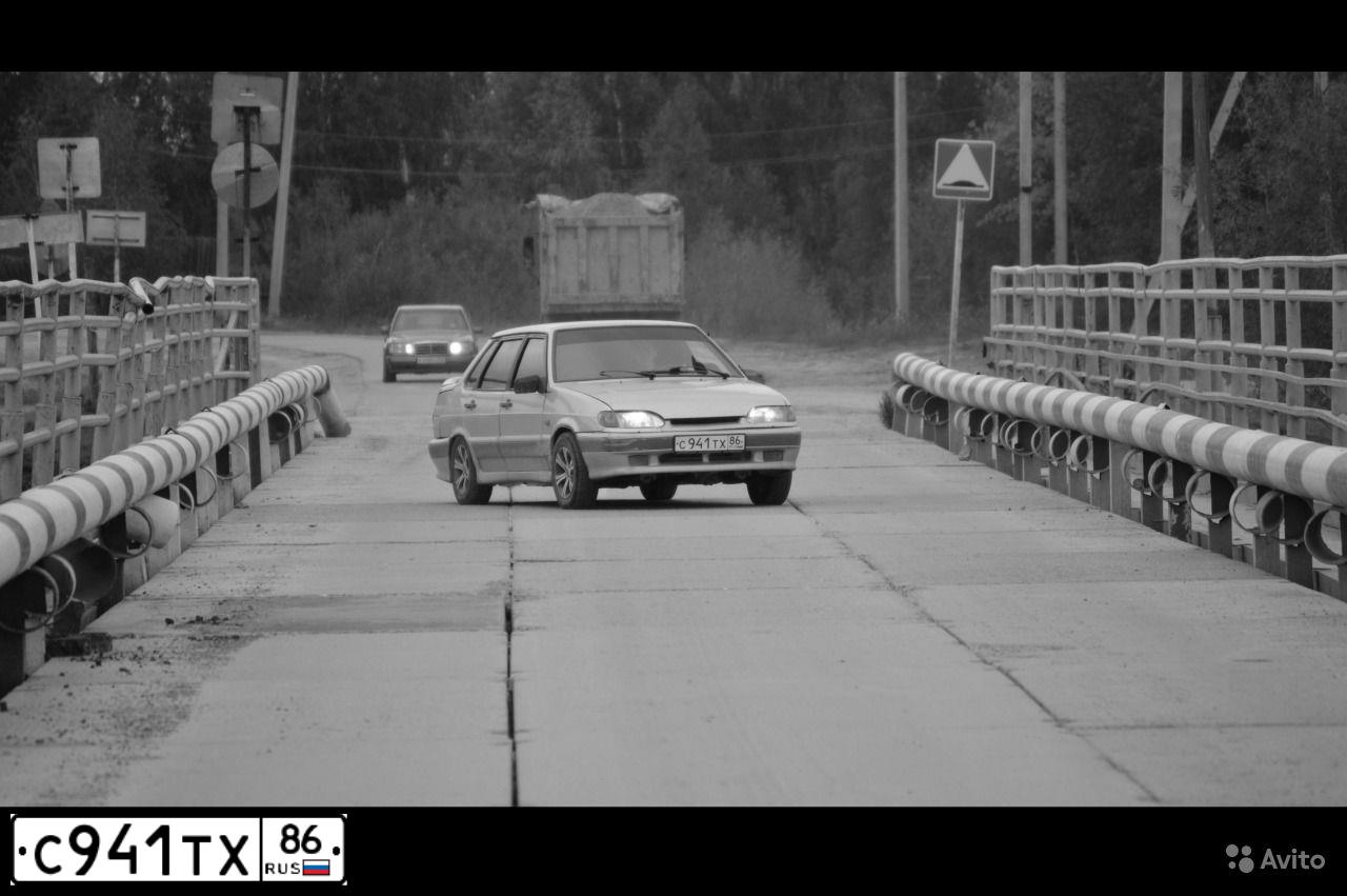 Фото автомобиля LADA 2115 SAMARA, 2001 — госномер С941ТХ86. Цвет: СЕРЕБРИСТЫЙ ЖЕЛТО-ЗЕЛЕНЫЙ