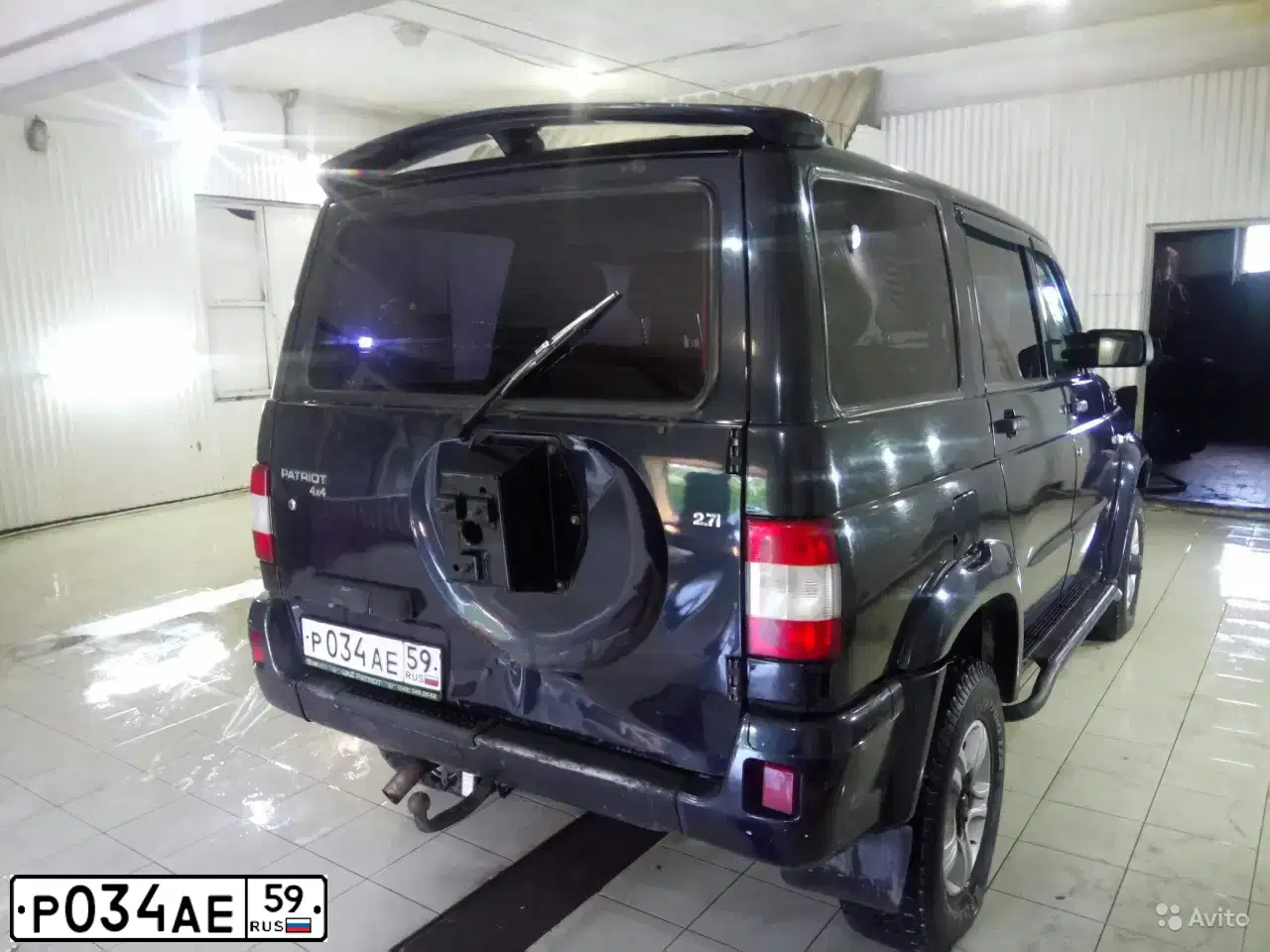 Фото автомобиля UAZ 3163 PATRIOT, 2006 — госномер Р034АЕ59. Цвет: ПОСЕЙДОН МЕТАЛЛИК