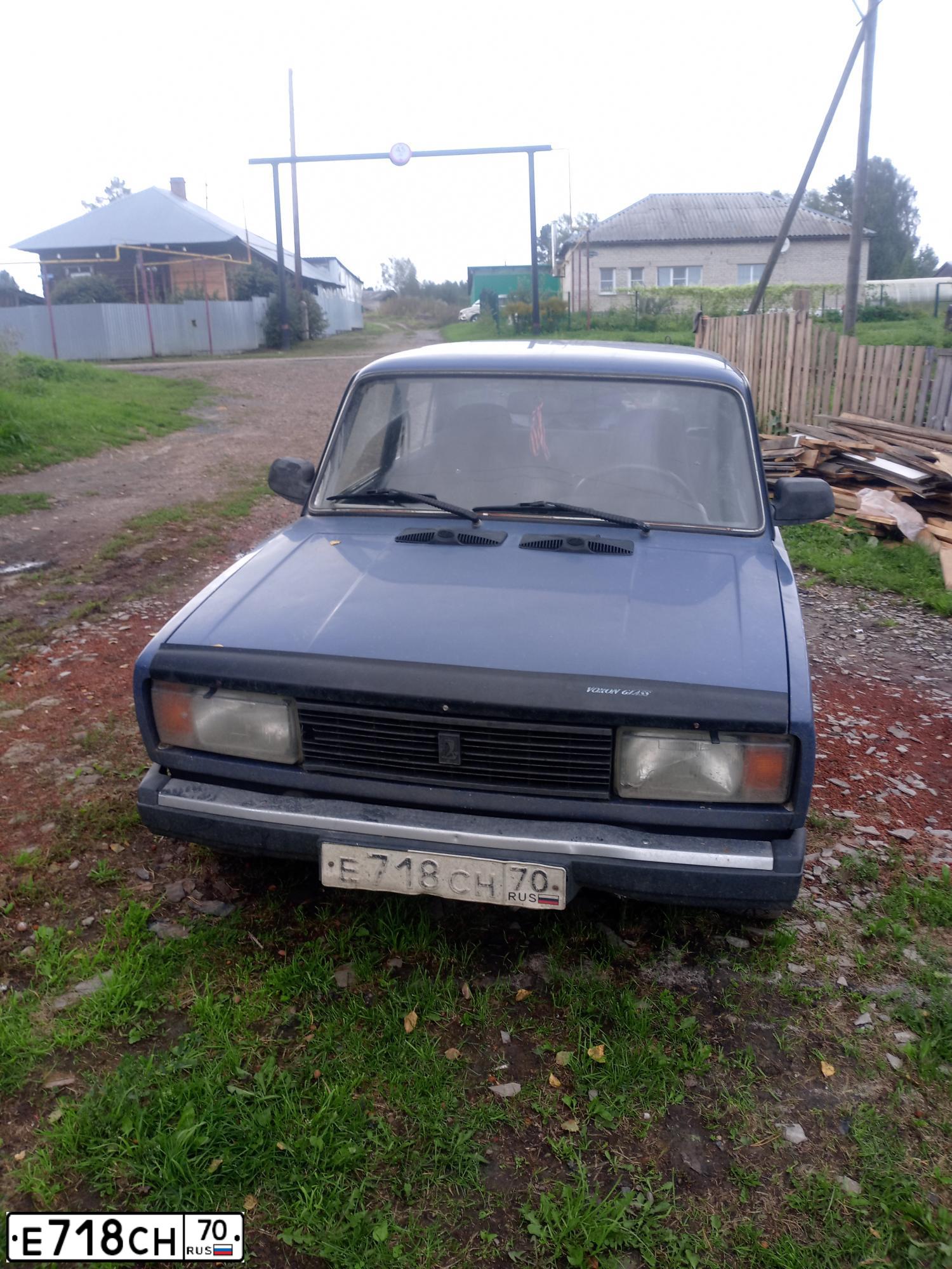 Фото автомобиля LADA 2105 LADA, 2006 — госномер Е718СН70. Цвет: СИНИЙ