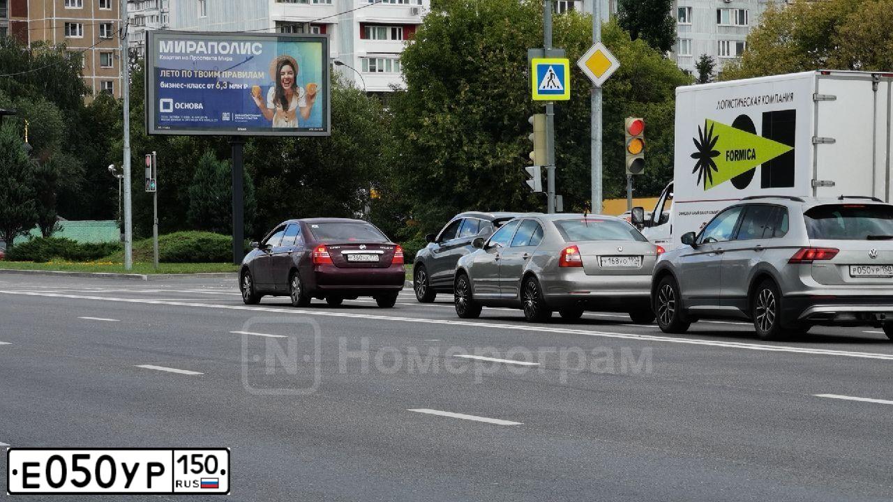 Фото автомобиля NISSAN PRIMERA, 2007 — госномер Е050УР150. Цвет: ЧЕРНЫЙ
