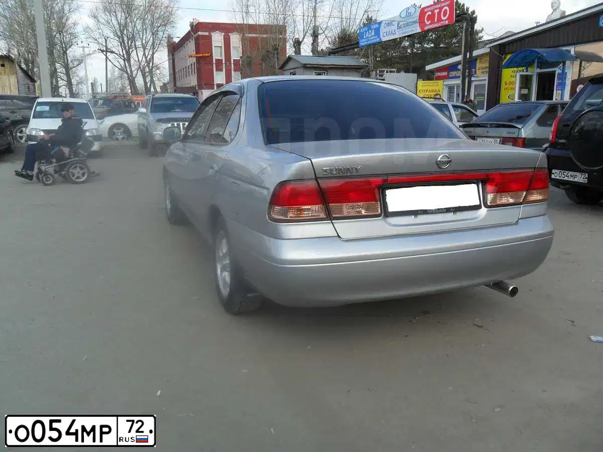 Фото автомобиля TAGAZ TINGO, 2012 — госномер О054МР72. Цвет: ЧЕРНЫЙ
