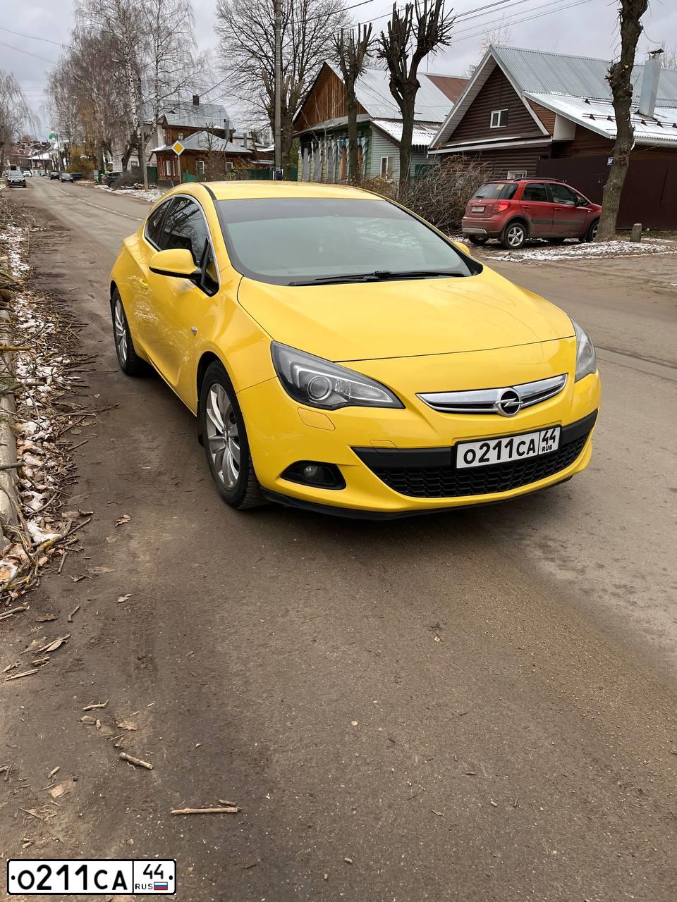 Фото автомобиля OPEL ASTRA, 2012 — госномер О211СА44. Цвет: ЖЁЛТЫЙ