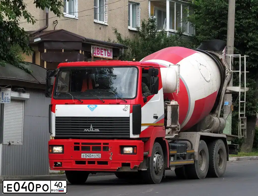 Фото автомобиля KAMAZ 6520 /6X4/, 2008 — госномер Е040РО40. Цвет: ОРАНЖЕВЫЙ