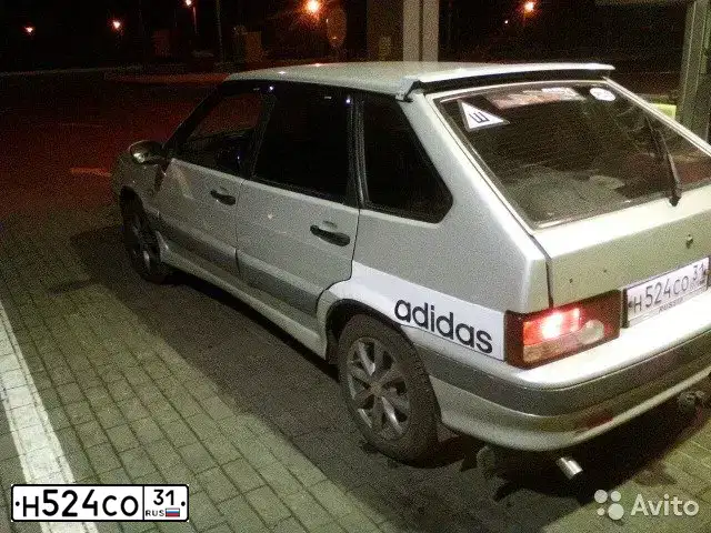 Фото автомобиля LADA 2114 SAMARA, 2004 — госномер Н524СО31. Цвет: МОЛОЧНО-БЕЛЫЙ СЕРЕБРИСТЫЙ