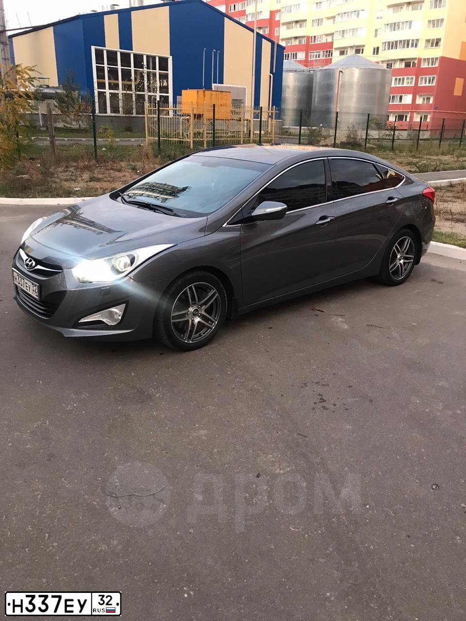 Фото автомобиля HYUNDAI I40, 2013 — госномер А009РЕ32. Цвет: СЕРЫЙ