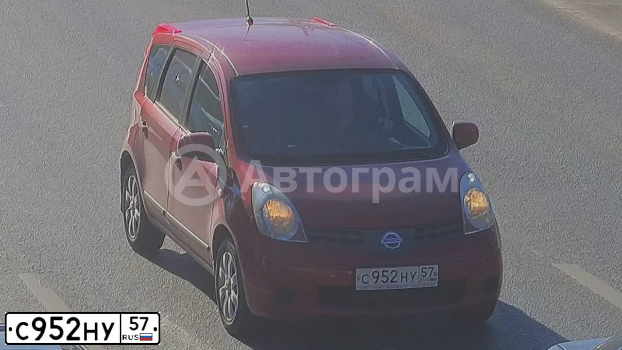 Фото автомобиля NISSAN NOTE, 2008 — госномер Н591УР76. Цвет: КРАСНЫЙ