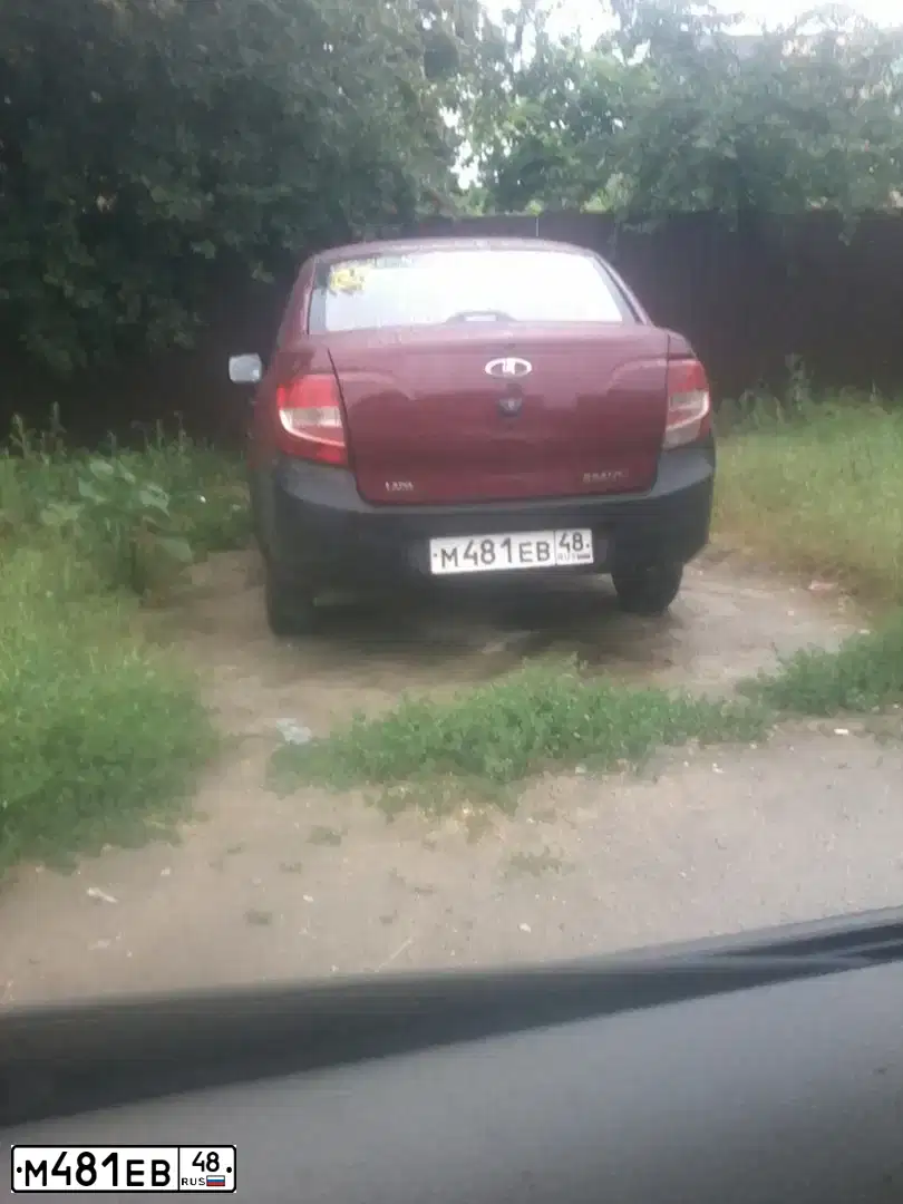 Фото автомобиля LADA 2190 GRANTA, 2013 — госномер М481ЕВ48. Цвет: КРАСНЫЙ