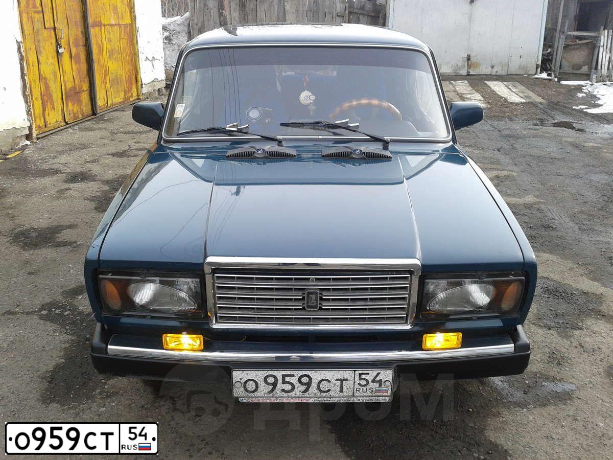 Фото автомобиля LADA 2107, 2004 — госномер М769МТ154. Цвет: СИНЕ ЗЕЛЕНЫЙ