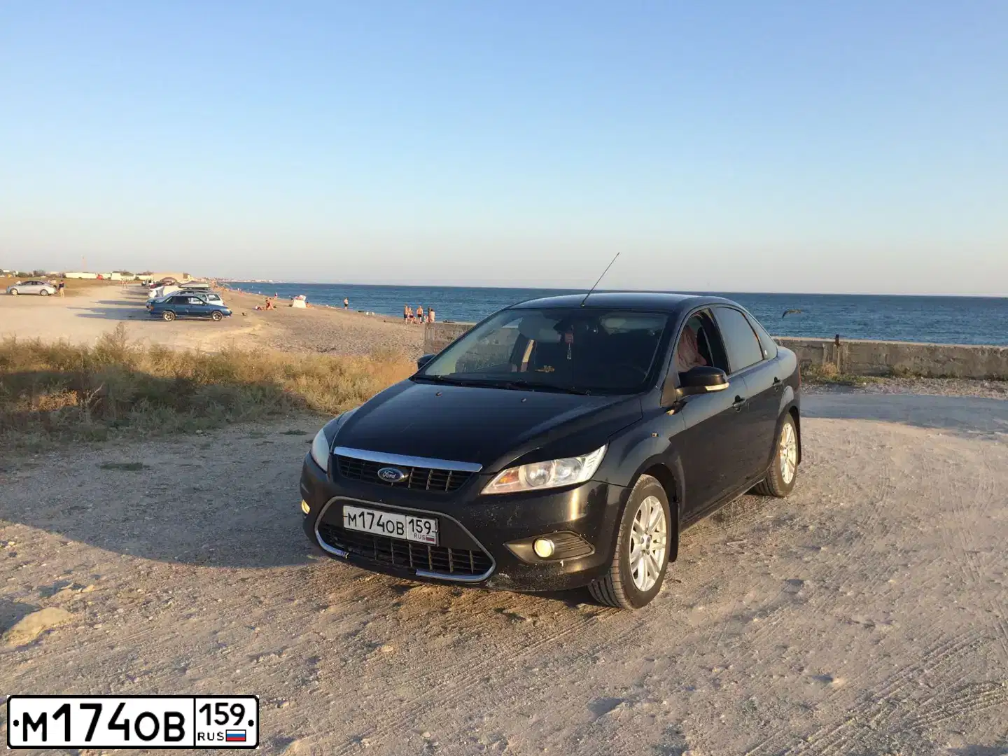 Фото автомобиля FORD FOCUS, 2008 — госномер М174ОВ159. Цвет: ЧЕРНЫЙ