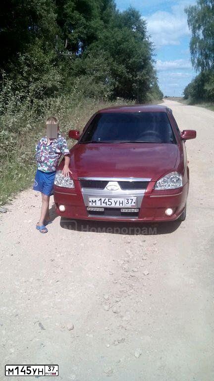 Фото автомобиля LADA 2172 PRIORA, 2009 — госномер М145УН37. Цвет: КРАСНЫЙ