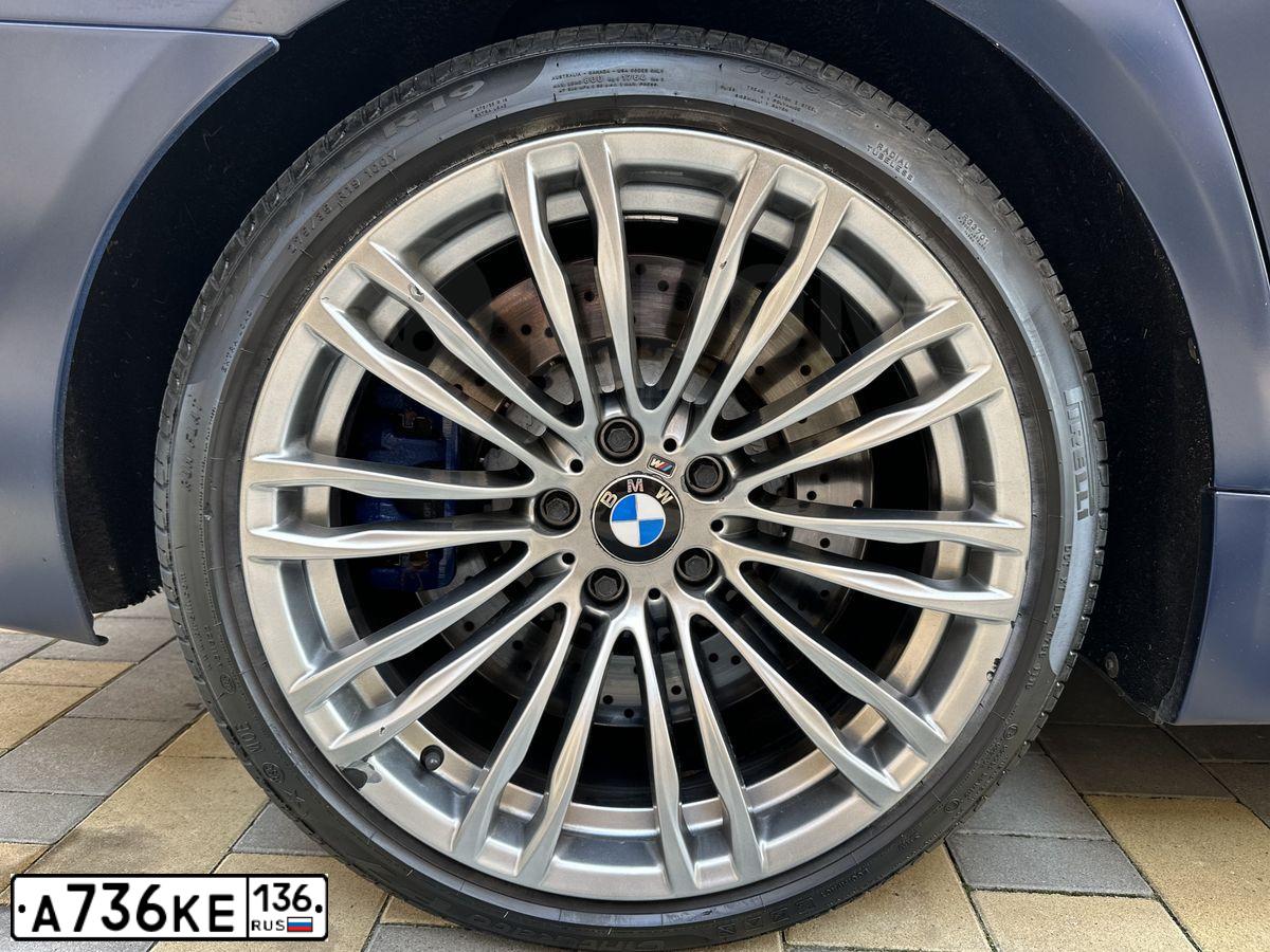 Фото автомобиля BMW M5, 2013 — госномер К230СТ134. Цвет: синий