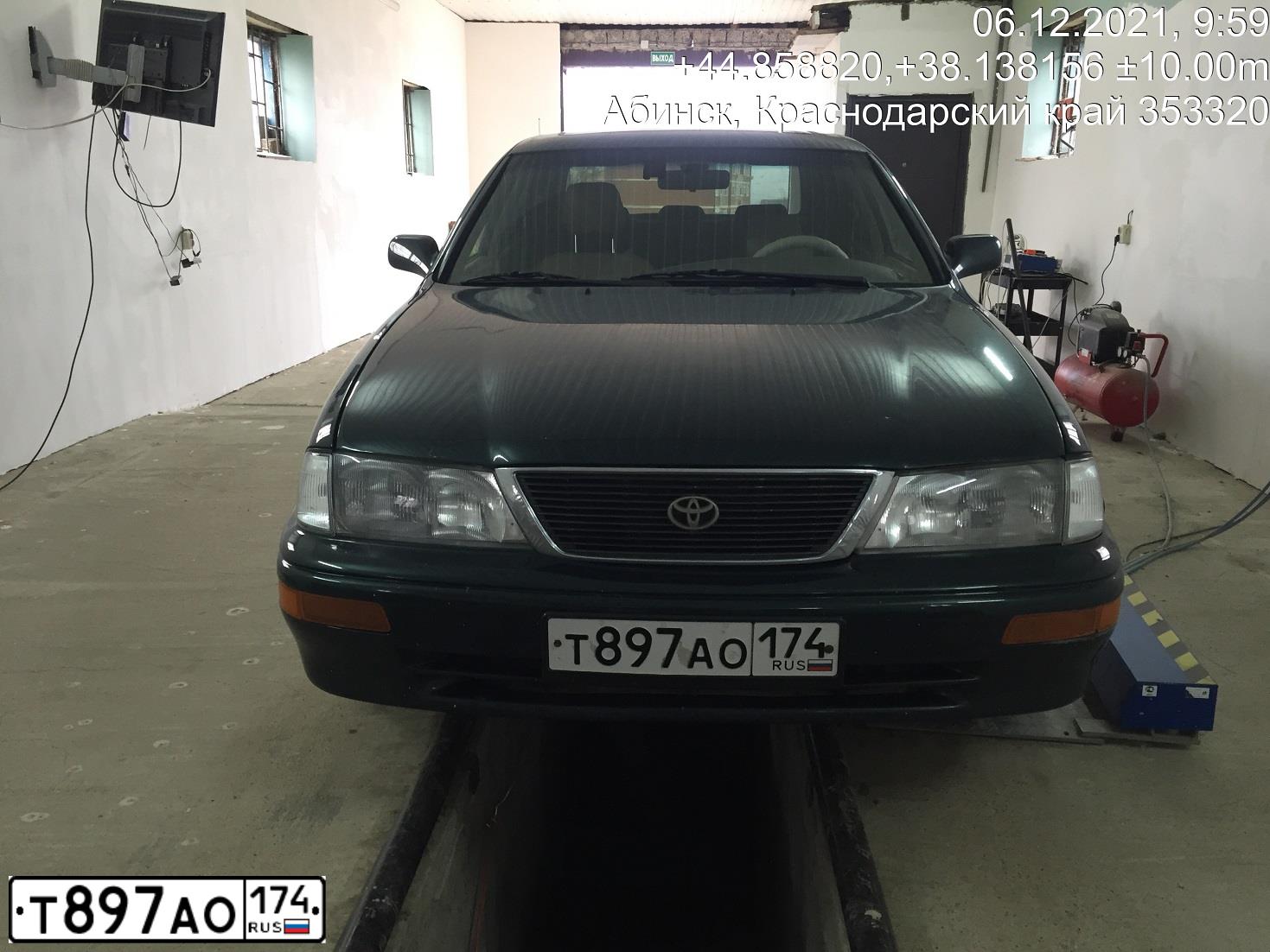 Фото автомобиля Toyota Corolla, 2005 — госномер Т897АО174