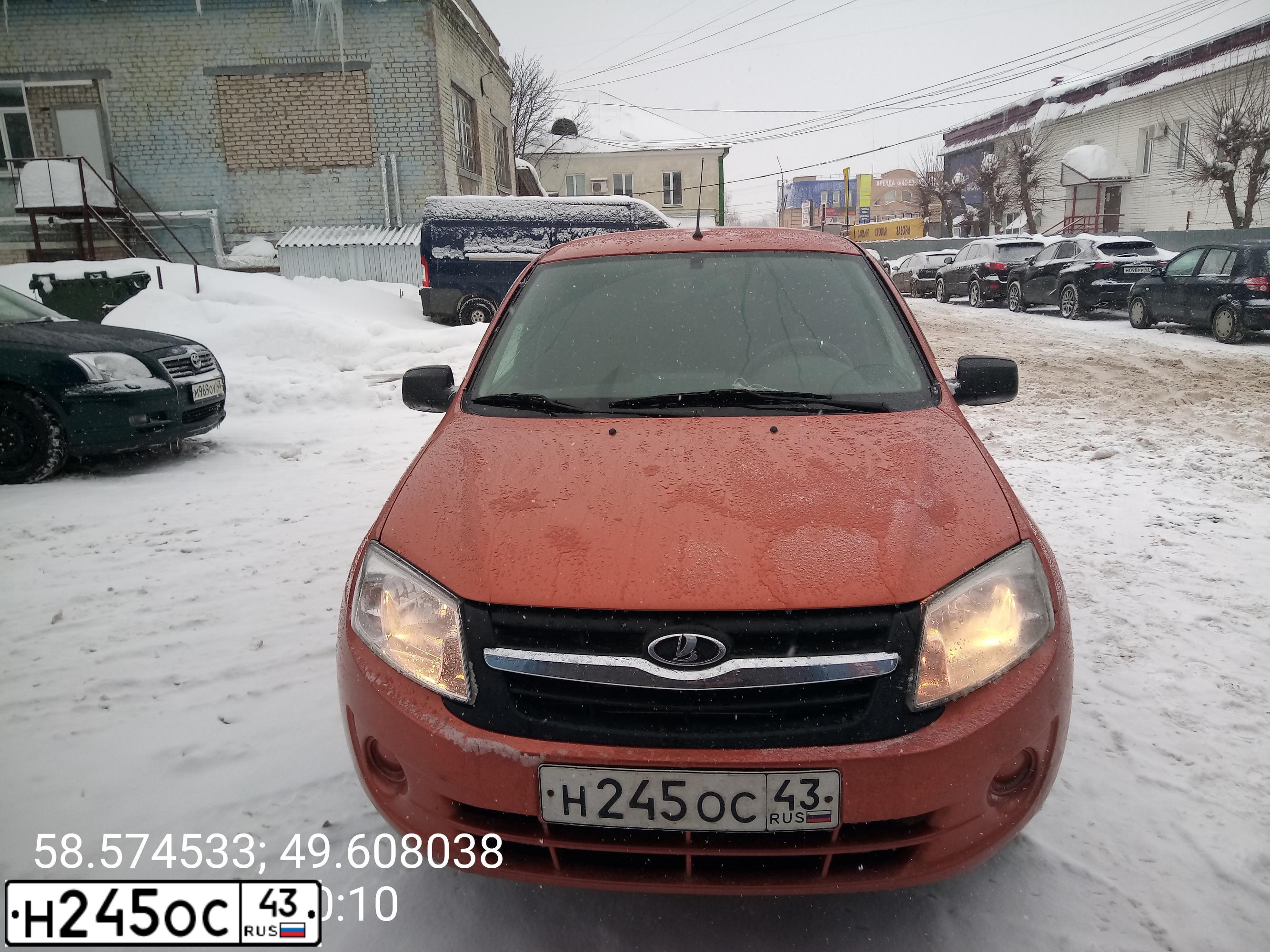 Фото автомобиля LADA 2190 GRANTA, 2013 — госномер Н245ОС43. Цвет: Оранжевый