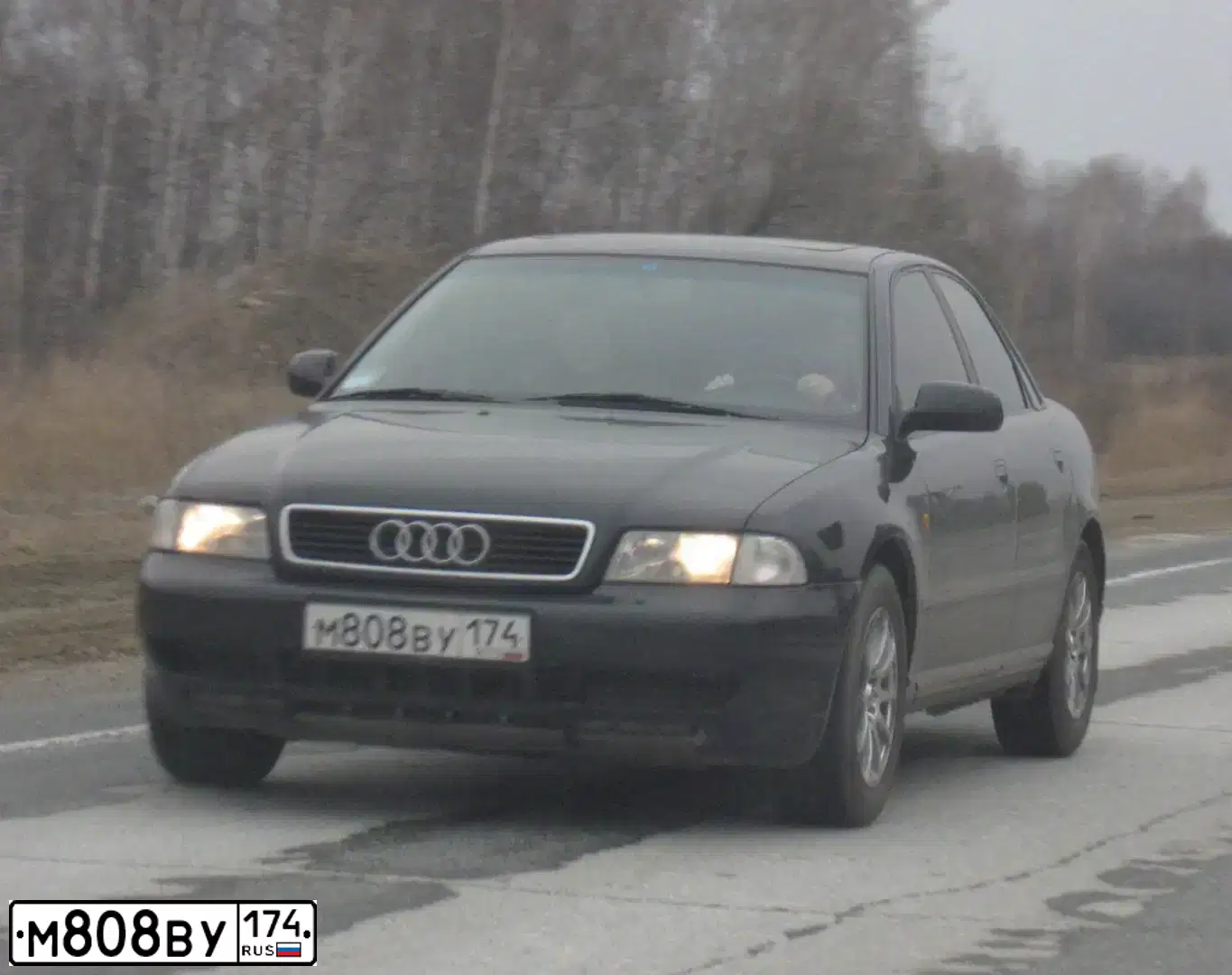 Фото автомобиля MITSUBISHI LANCER, 2012 — госномер М808ВУ174. Цвет: ЧЕРНЫЙ