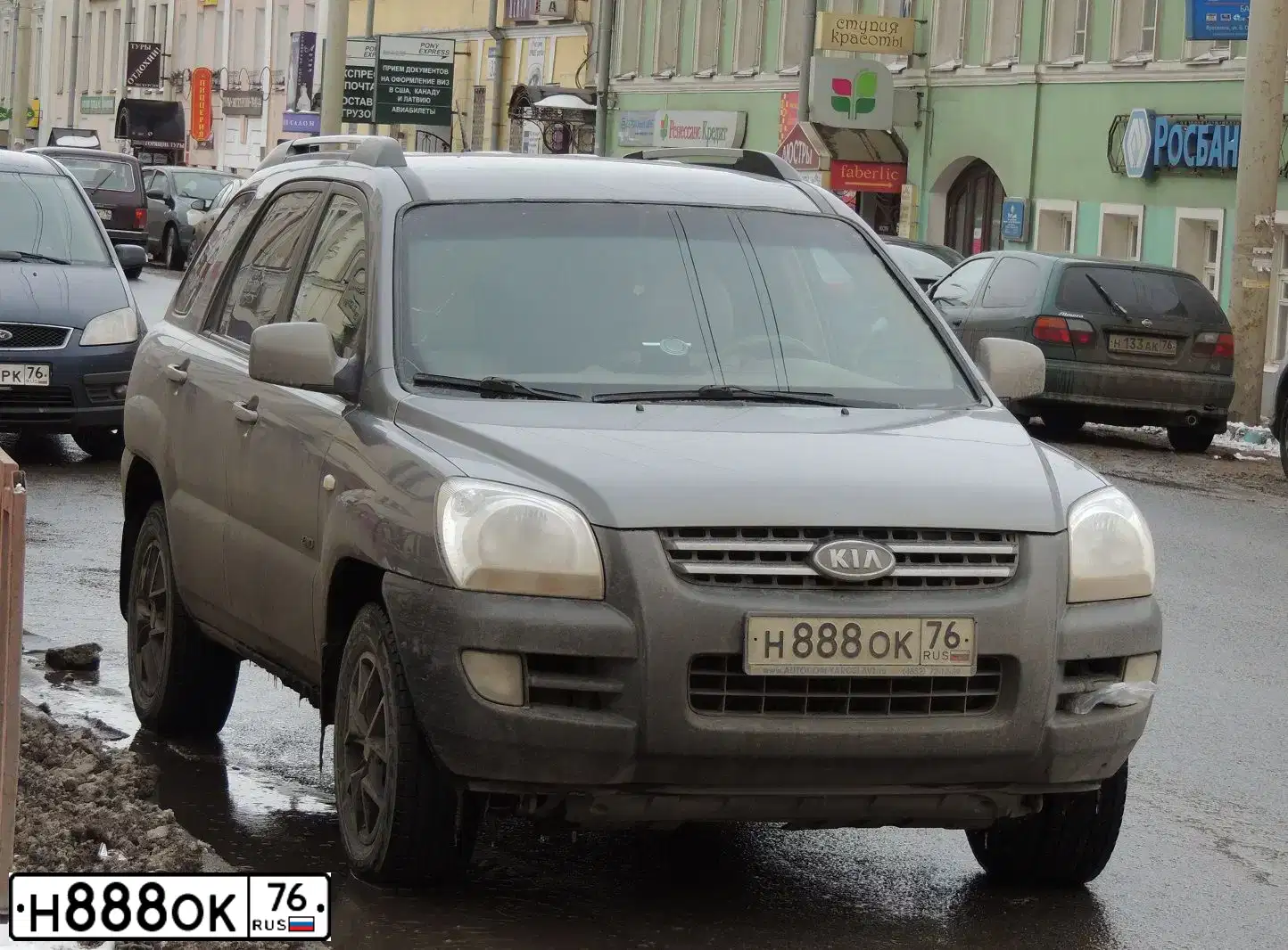 Фото автомобиля KIA SPORTAGE, 2006 — госномер М269ВХ76. Цвет: СЕРЫЙ