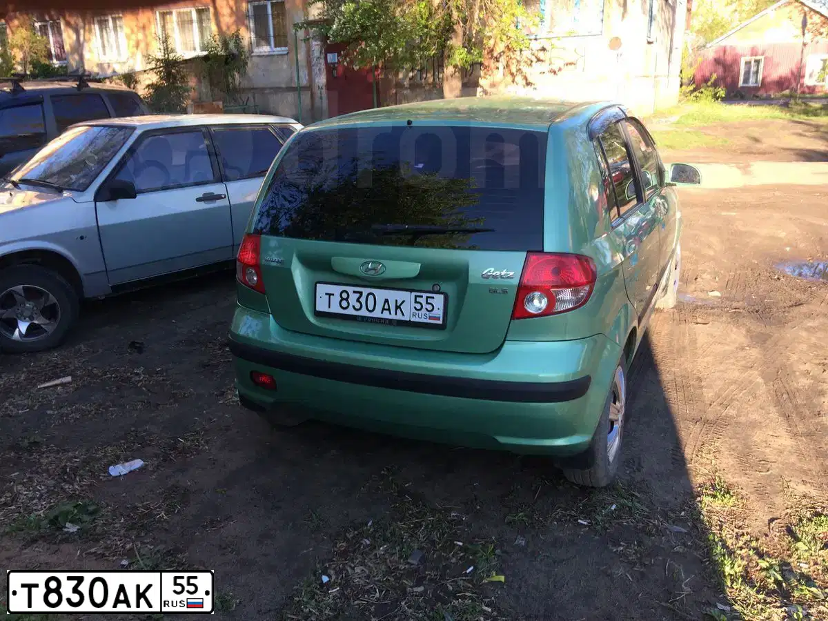 Фото автомобиля HYUNDAI GETZ, 2003 — госномер Т830АК55. Цвет: СВЕТЛО-ЗЕЛЕНЫЙ