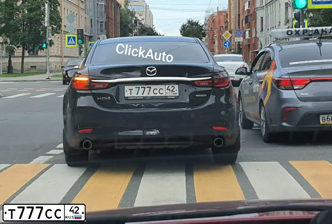 Фото автомобиля CITROEN C4, 2013 — госномер Т777СС42. Цвет: ТЕМНО-СИНИЙ