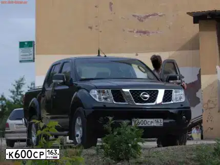 Фото автомобиля VOLKSWAGEN AMAROK, 2013 — госномер Х848РН33. Цвет: Белый