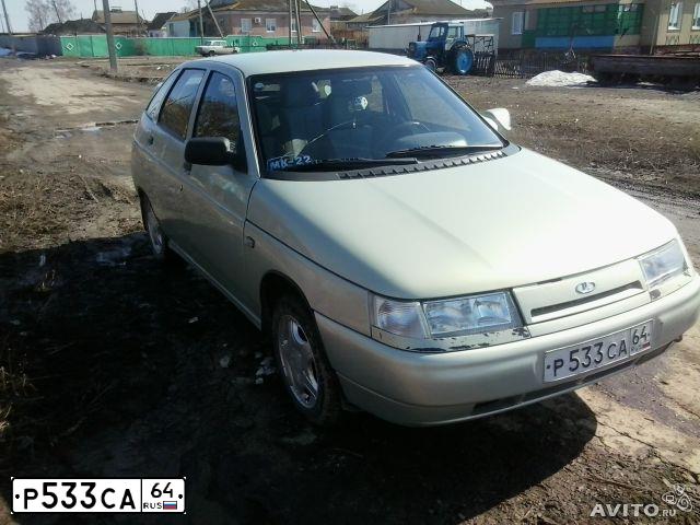 Фото автомобиля LADA 2112, 2002 — госномер Р533СА64. Цвет: СЕРЕБРИСТ.ЖЕЛТО-ЗЕЛЕНЫЙ