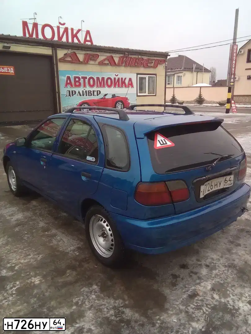 Фото автомобиля LADA 2109 SAMARA, 1999 — госномер Н726НУ64. Цвет: ЗЕЛЕНЫЙ