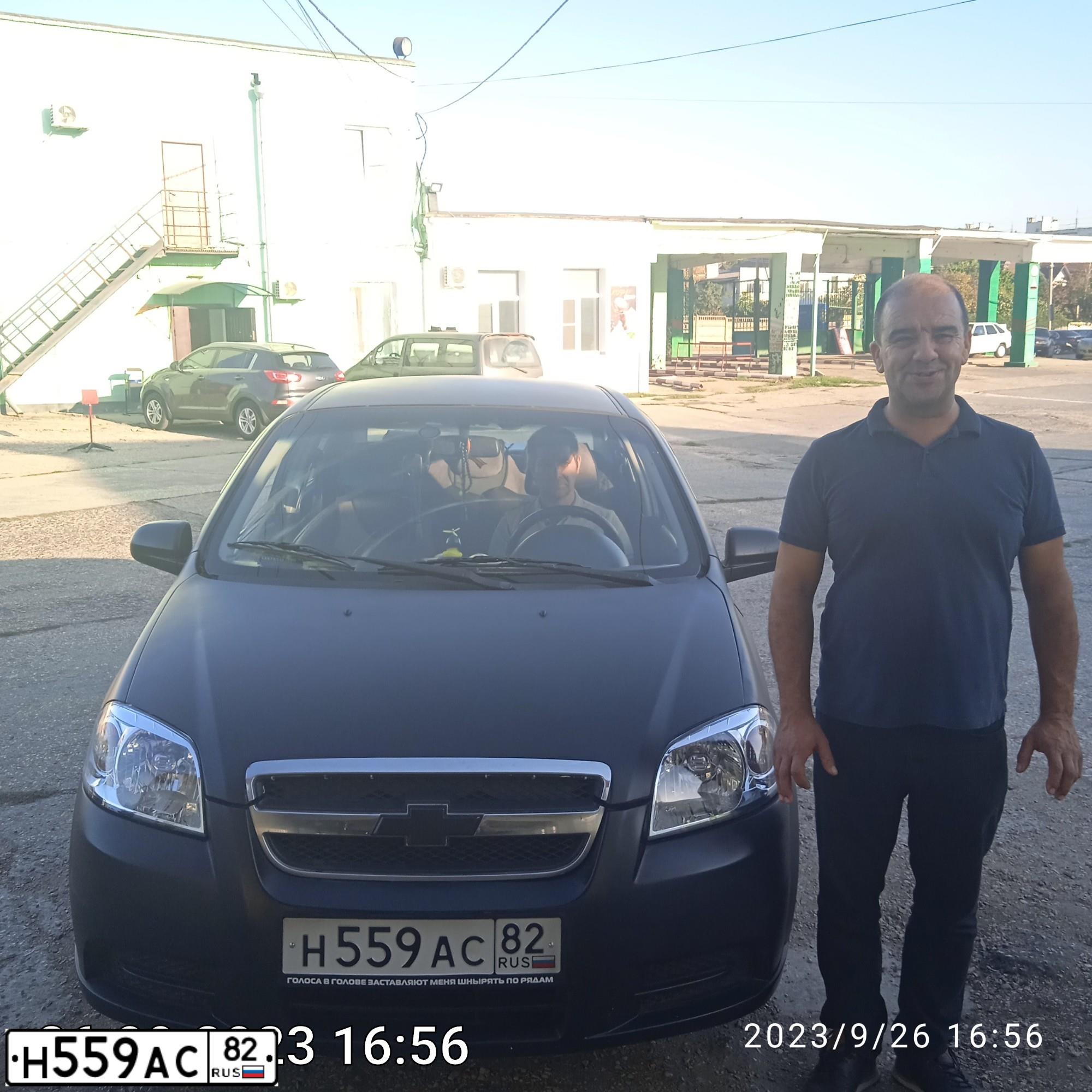 Фото автомобиля CHEVROLET AVEO, 2006 — госномер Н559АС82. Цвет: ЧЕРНЫЙ