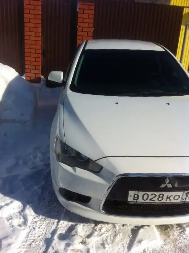 Фото автомобиля VOLKSWAGEN JETTA, 2011 — госномер В028КО37. Цвет: Белый