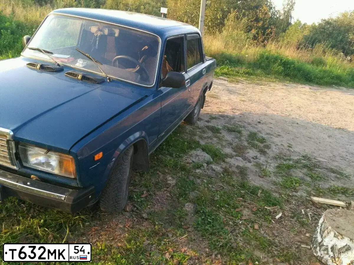 Фото автомобиля LADA 2107, 2004 — госномер К990РТ154. Цвет: СИНЕ ЗЕЛЕНЫЙ