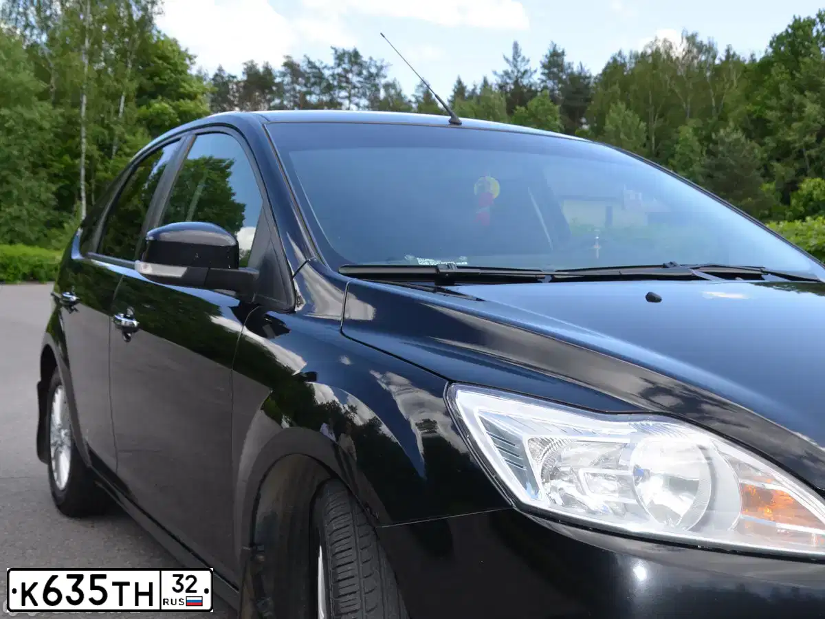 Фото автомобиля FORD FOCUS, 2010 — госномер К635ТН32. Цвет: ЧЕРНЫЙ