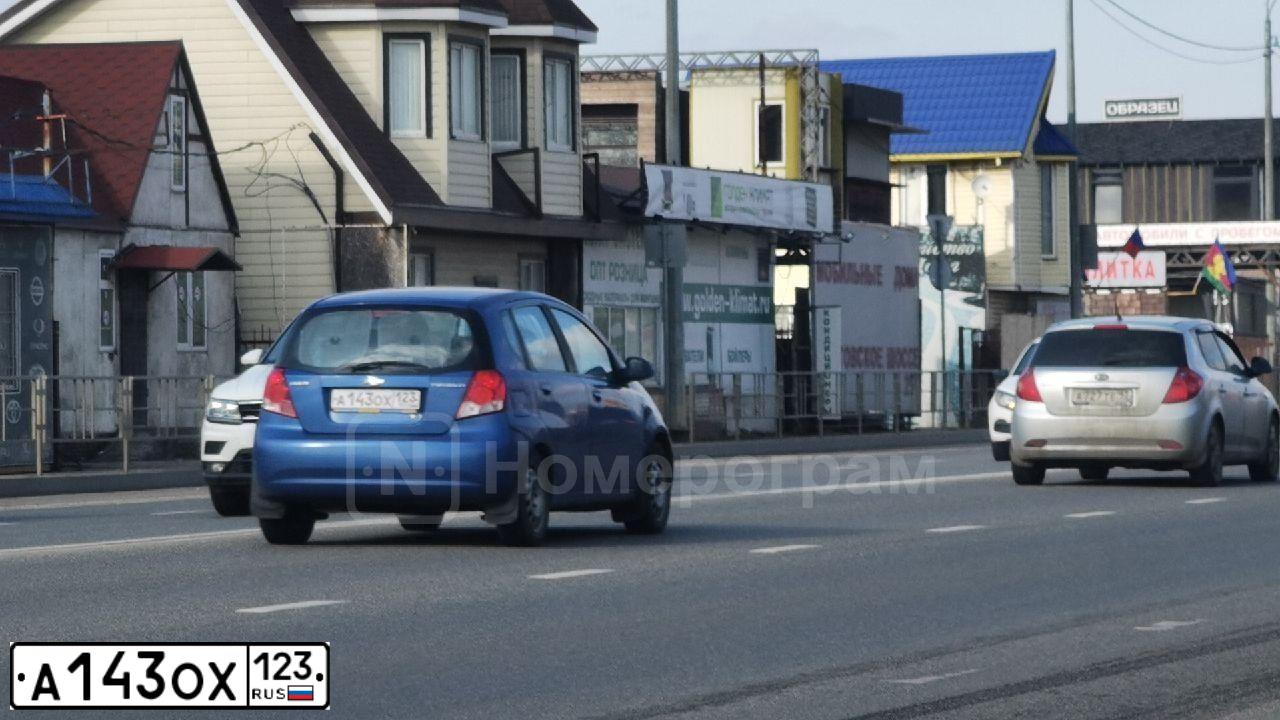 Фото автомобиля CHEVROLET AVEO, 2007 — госномер А143ОХ123. Цвет: СИНИЙ