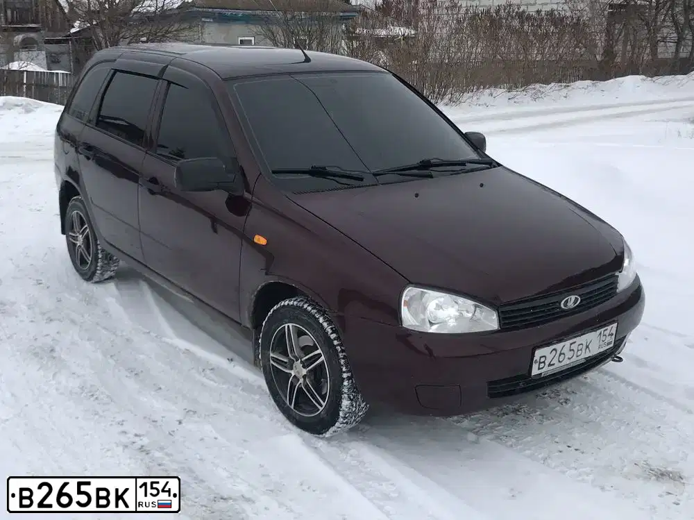 Фото автомобиля LADA 1117 KALINA, 2012 — госномер Н540МТ154. Цвет: ТЕМНО ВИШНЕВЫЙ