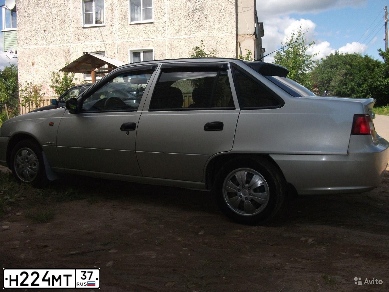 Фото автомобиля DAEWOO NEXIA, 2008 — госномер А020НА799. Цвет: СЕРЫЙ