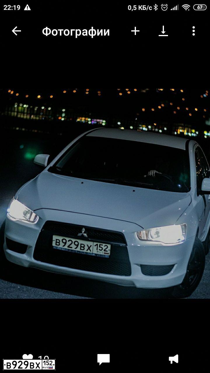 Фото автомобиля MITSUBISHI LANCER, 2008 — госномер Р795НН05. Цвет: Белый