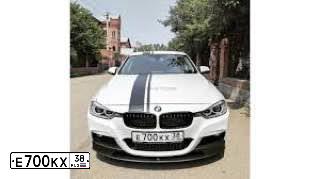 Фото автомобиля BMW SERIE 3, 2011 — госномер Е700КХ38. Цвет: СЕРЫЙ