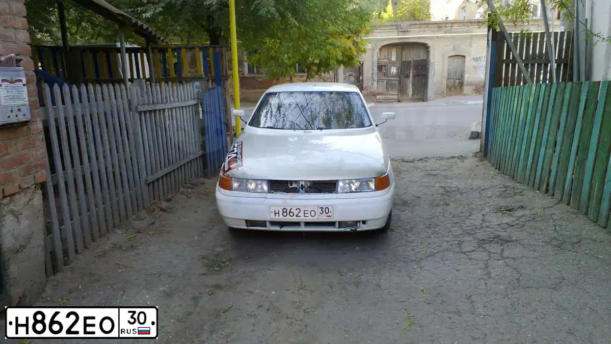 Фото автомобиля LADA 2110, 1998 — госномер Н862ЕО30. Цвет: БЕЛЫЙ