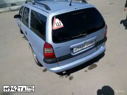 Фото автомобиля KIA RIO, 2012 — госномер Р827МР58. Цвет: Белый
