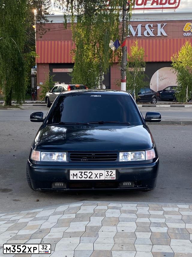 Фото автомобиля LADA 2110 LADA, 2006 — госномер М352ХР32. Цвет: ГРАФИТОВЫЙ МЕТАЛЛИК