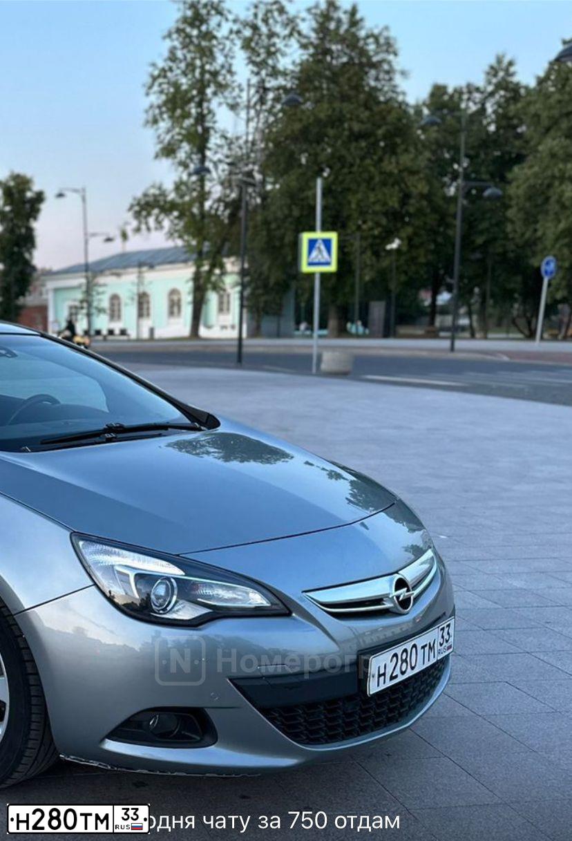 Фото автомобиля OPEL ASTRA, 2012 — госномер А123УЕ13. Цвет: СЕРЫЙ