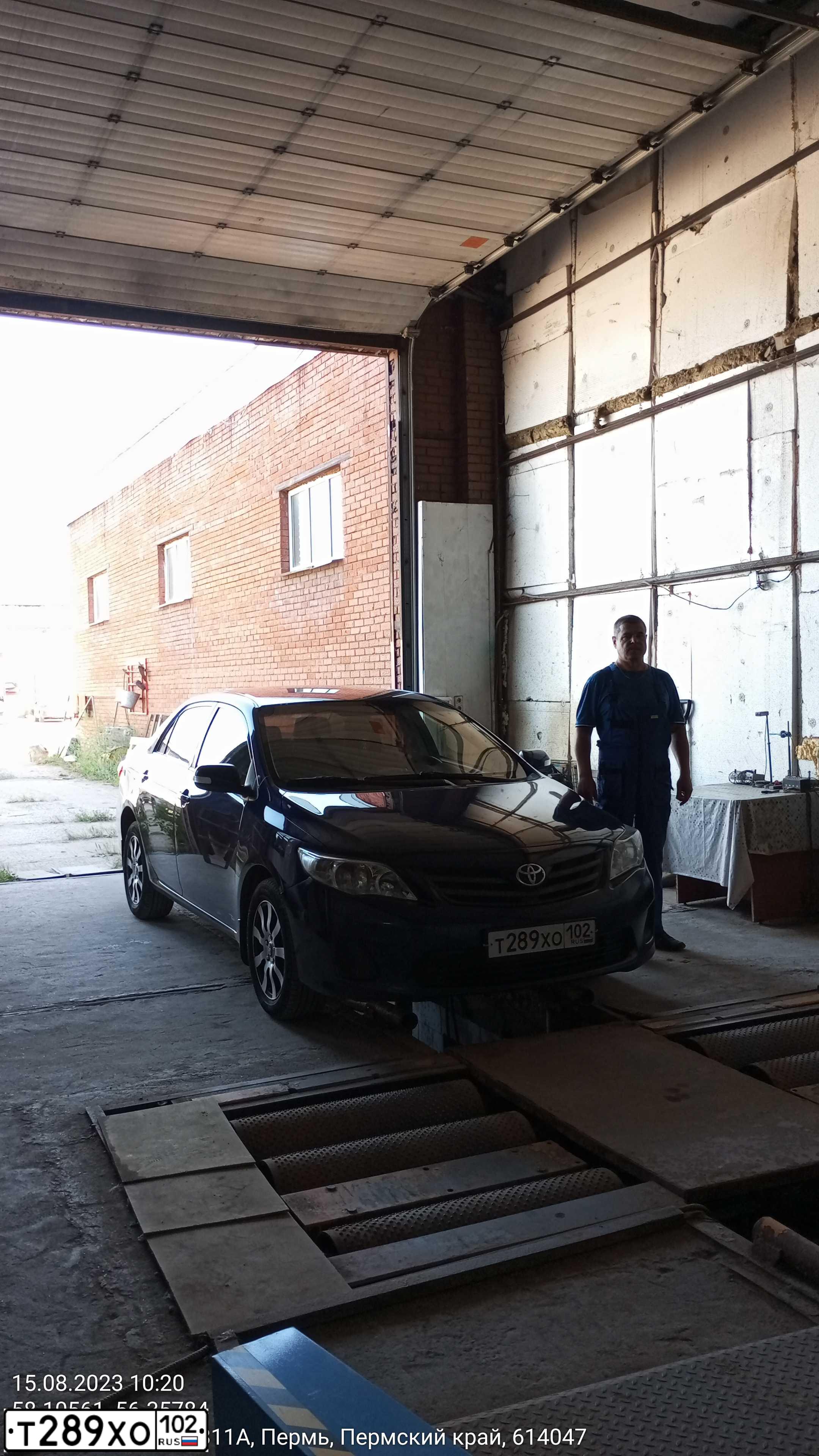 Фото автомобиля TOYOTA COROLLA, 2011 — госномер К473КС702. Цвет: Темно-синий