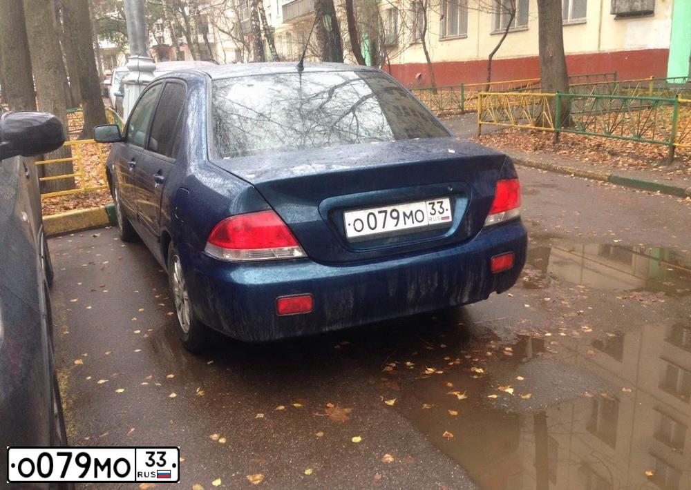 Фото автомобиля MITSUBISHI LANCER, 2005 — госномер О079МО33. Цвет: СИНИЙ