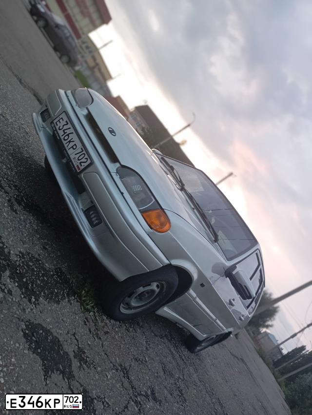 Фото автомобиля LADA 2114 SAMARA, 2006 — госномер Е346КР702. Цвет: МОЛОЧНО-БЕЛЫЙ СЕР.