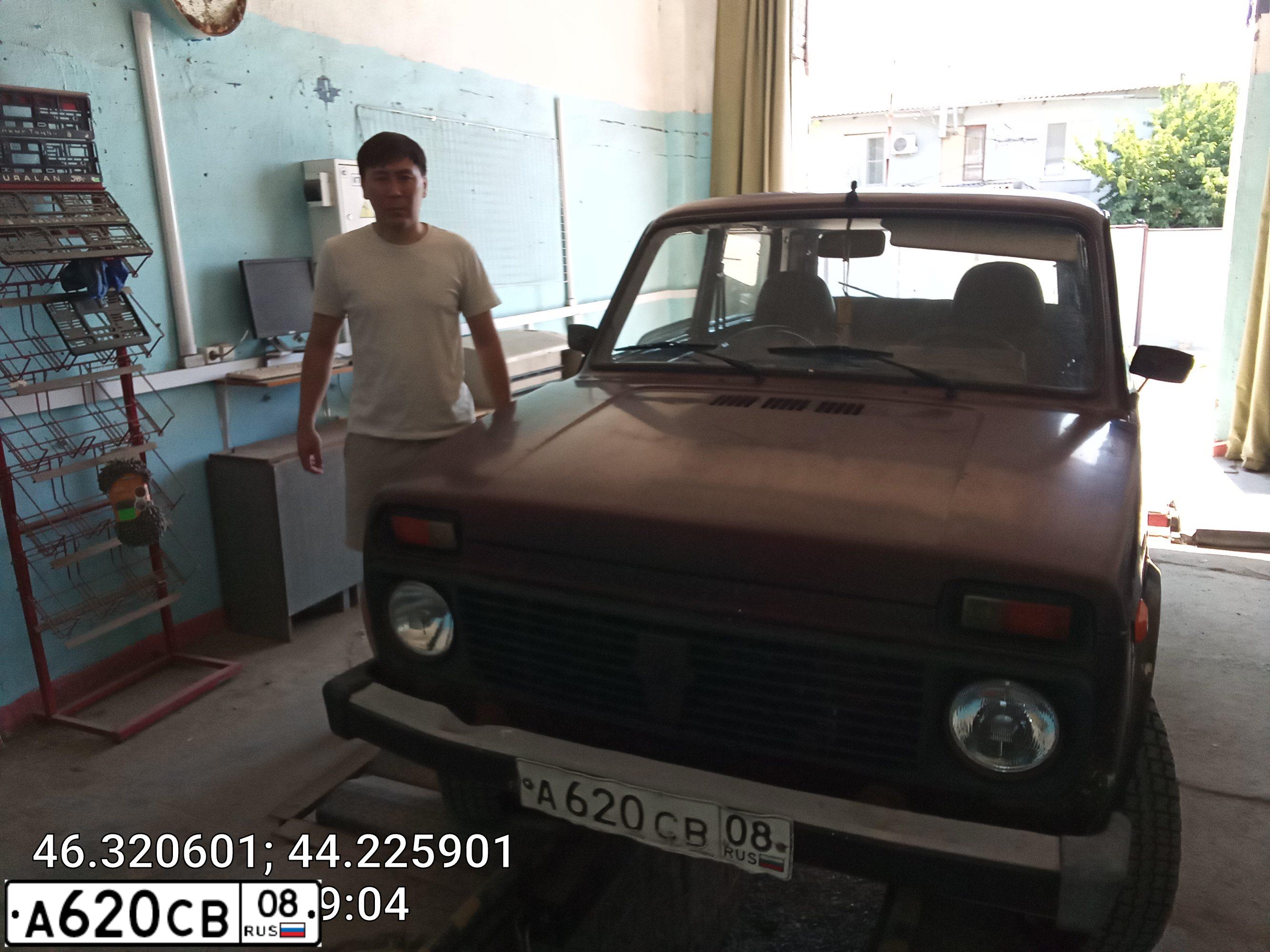 Фото автомобиля LADA 2121 NIVA, 2008 — госномер Е568НС08. Цвет: ТЕМНО-ВИШНЕВЫЙ