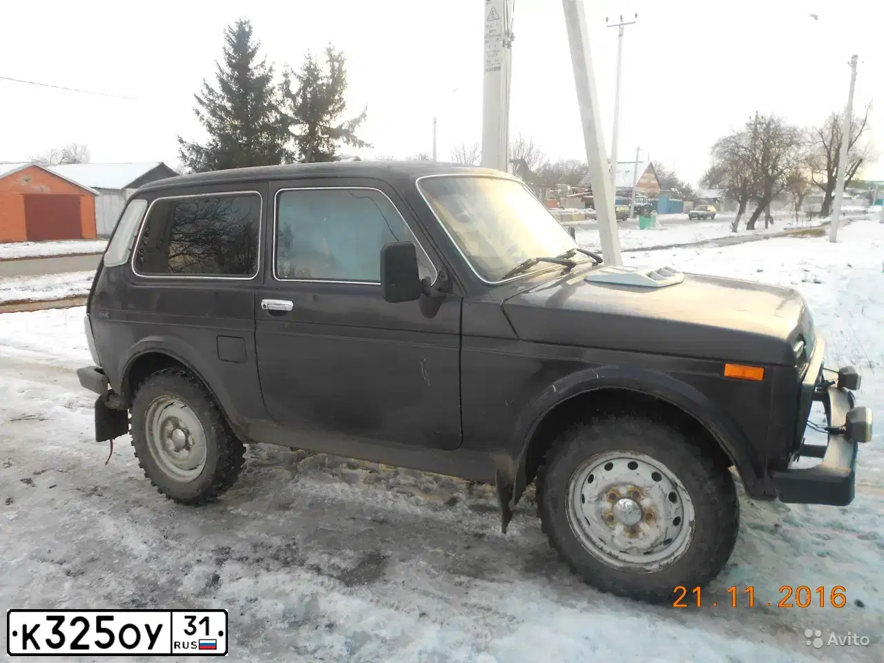 Фото автомобиля LADA 2121 NIVA, 2000 — госномер К325ОУ31. Цвет: ФИОЛЕТОВЫЙ