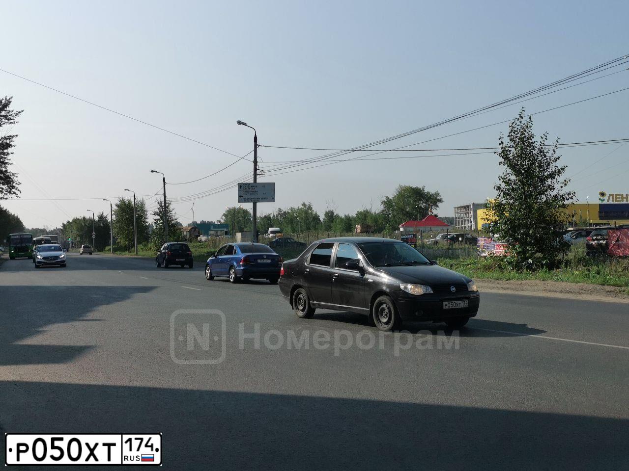 Фото автомобиля FIAT ALBEA, 2007 — госномер Р050ХТ174. Цвет: ЧЕРНЫЙ