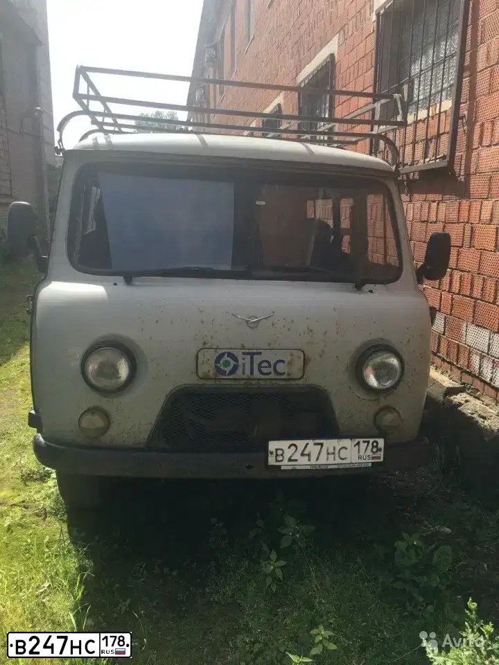 Фото автомобиля УАЗ 390995, 2012 — госномер В247НС178. Цвет: БЕЛАЯ НОЧЬ