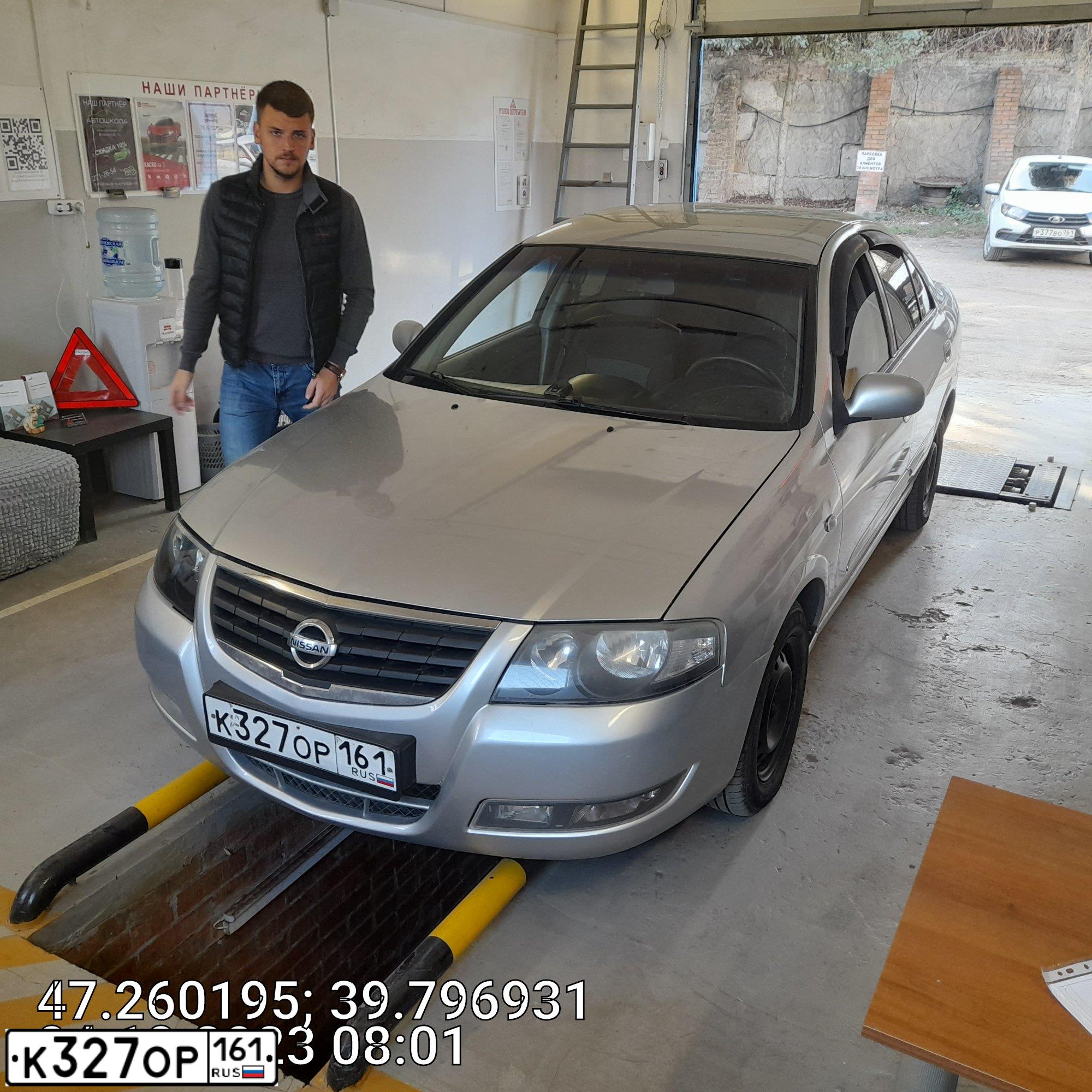 Фото автомобиля NISSAN ALMERA, 2011 — госномер К327ОР161. Цвет: СЕРЕБРИСТЫЙ