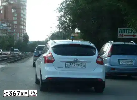 Фото автомобиля FORD FOCUS, 2012 — госномер С367ХР34. Цвет: БЕЛЫЙ