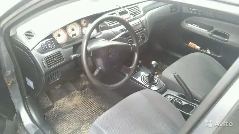 Фото автомобиля MITSUBISHI LANCER, 2005 — госномер Х912ЕМ37. Цвет: СЕРЫЙ