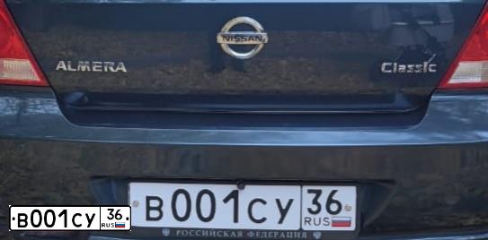 Фото автомобиля GAZ 3102 WOLGA, 1998 — госномер Е001НК36. Цвет: ЧЕРНЫЙ